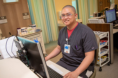 Dan Garza working at desk