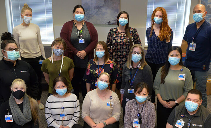 Group of Medical staff wearing blue masks