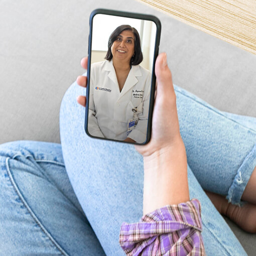 Patient conversing with an El Camino Health physician on her mobile phone.