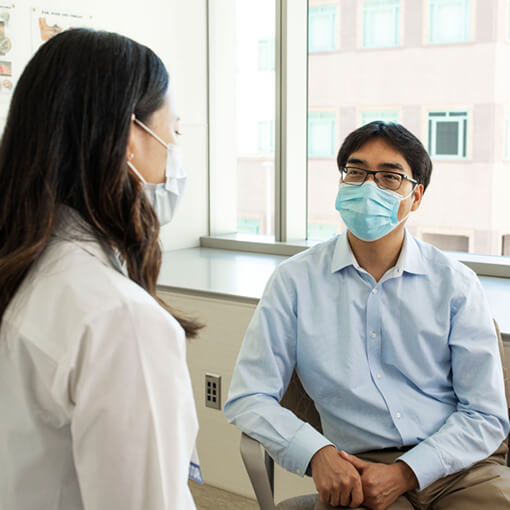 El Camino Health physician and patient conversing during a primary care visit.