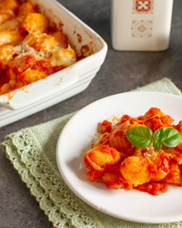 Baked Gnocchi with Tomato Parmesan Sauce and Fresh Basil