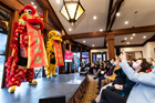 Lion dancers ushered in good luck and good fortune