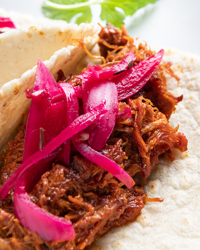 Cochinita Pibil with pickled red onions