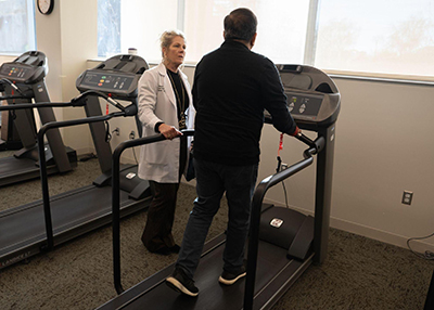 Sudip being coached on treadmill