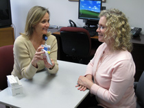 Image of a rehabilitation patient with a speech therapist