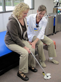 Image of a rehabilitation patient with an occupational therapist