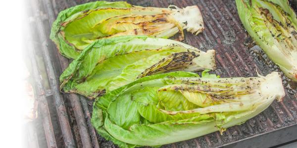Fresh Romaine Lettuce Grilling on a Barbecue