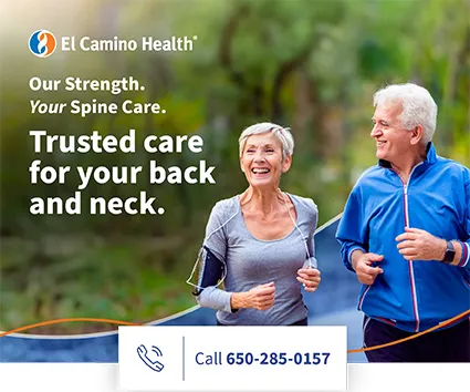 Two older adults jogging together outdoors, promoting an active lifestyle and spine health.